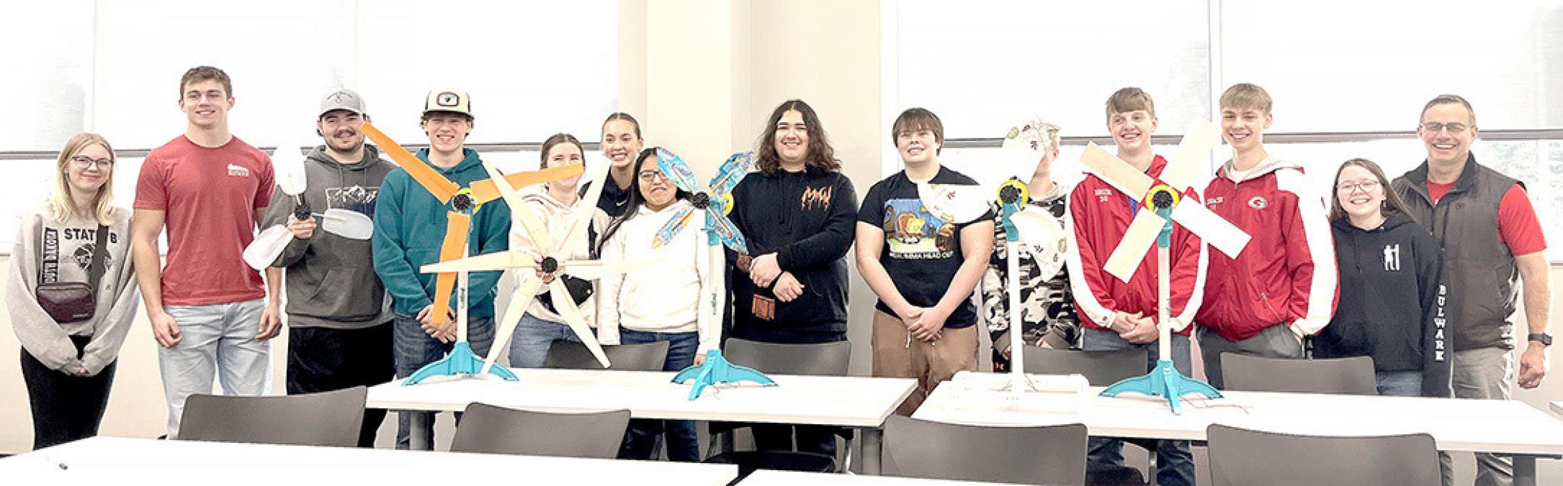 Finola Reuer, Max Cook, Jamison VanderPol, Jess Vanderpol, Dani Timanus, Asia VanDerWerff, Ellie Talsma, Hayden Westfall, Max Bearshield, Dillon Johnson, Bo Brozik, Lincoln Juracek, Madi Graber, and instructor Mike Murray, shown l to r, representing Gregory High School in the KidWind Competition, have earned an invitation to attend the 2024 World KidWind Challenge in Minneapolis, MN, in May. (Submitted photo)