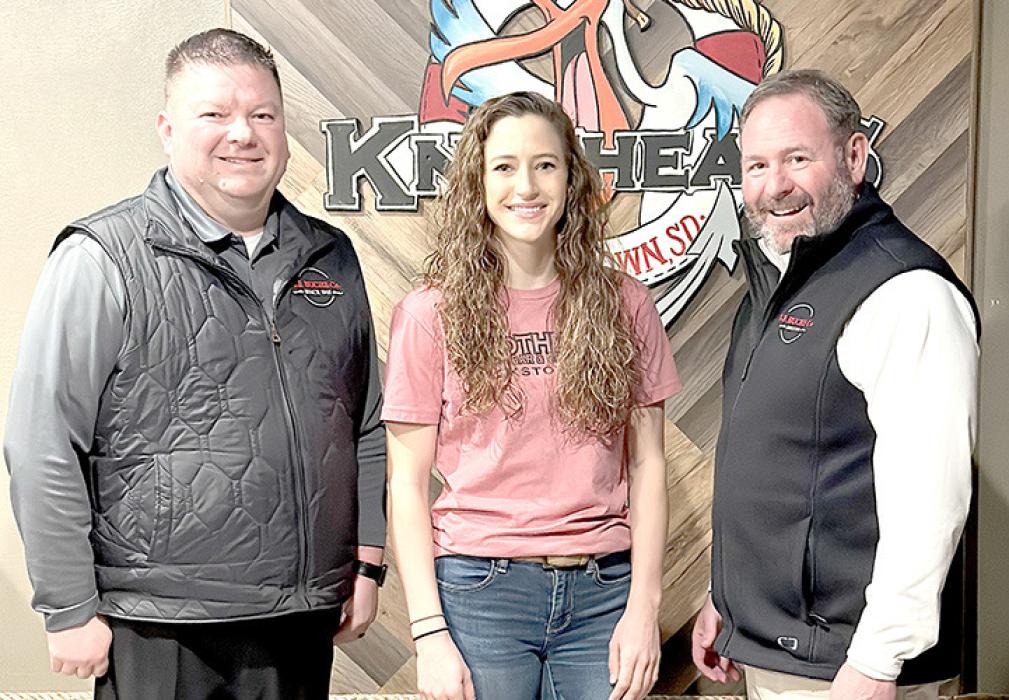 Chris McFayden, left, and RF Buche, right, announce the purchase of Knothead’s Bar &amp; Grill in Pickstown, and Kristan Soukup, center, will join the team as owner/operator of the new business.
